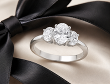 Load image into Gallery viewer, STERLING SILVER OVAL CUBIC ZIRCONIA TRILOGY RING